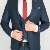 Костюм-тройка изумрудного цвета Каталог