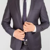 Костюм-двойка темно-фиолетового цвета. Каталог