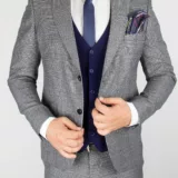 Костюм-тройка серого цвета с трикотажным синим жилетом Каталог