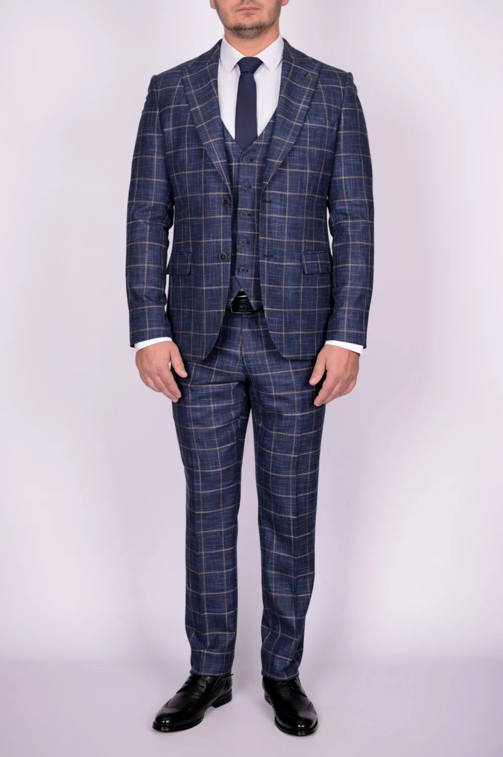 Костюм-тройка синего цвета в крупную клетку Брючные мужские костюмы