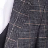 Костюм-тройка в крупную клетку с однотонными брюками Каталог